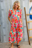 Dazzle In Orange & Aqua Floral Smocked Notched Neck Midi Dress - Charming Charlie