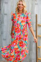 Dazzle In Orange & Aqua Floral Smocked Notched Neck Midi Dress - Charming Charlie