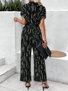 Tied Printed Mock Neck Wide Leg Jumpsuit - Charming Charlie