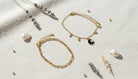 2 Gold Bracelets With Blue Moon - Charming Charlie