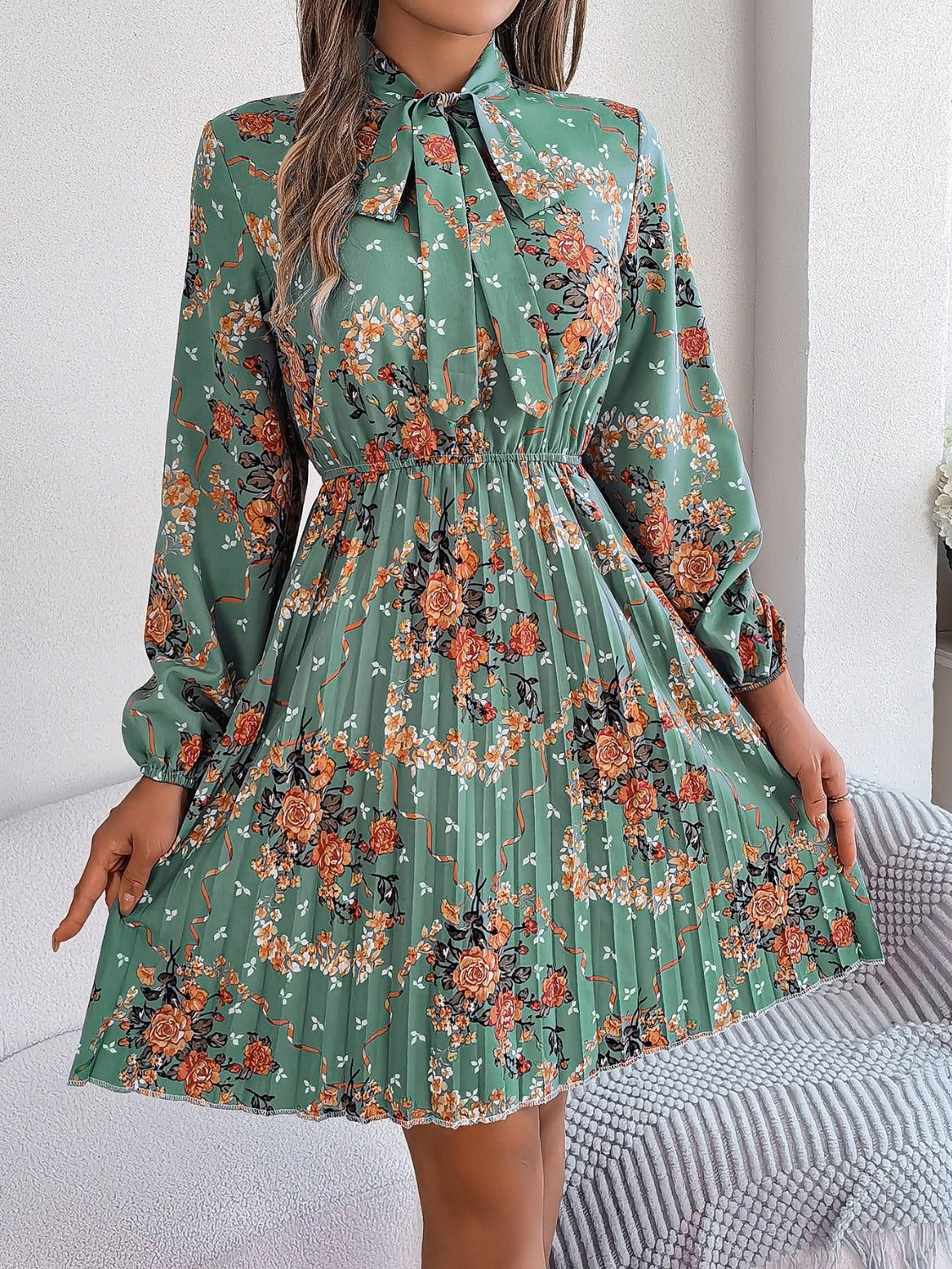 Pleated Printed Tie Neck Long Sleeve Dress - Charming Charlie