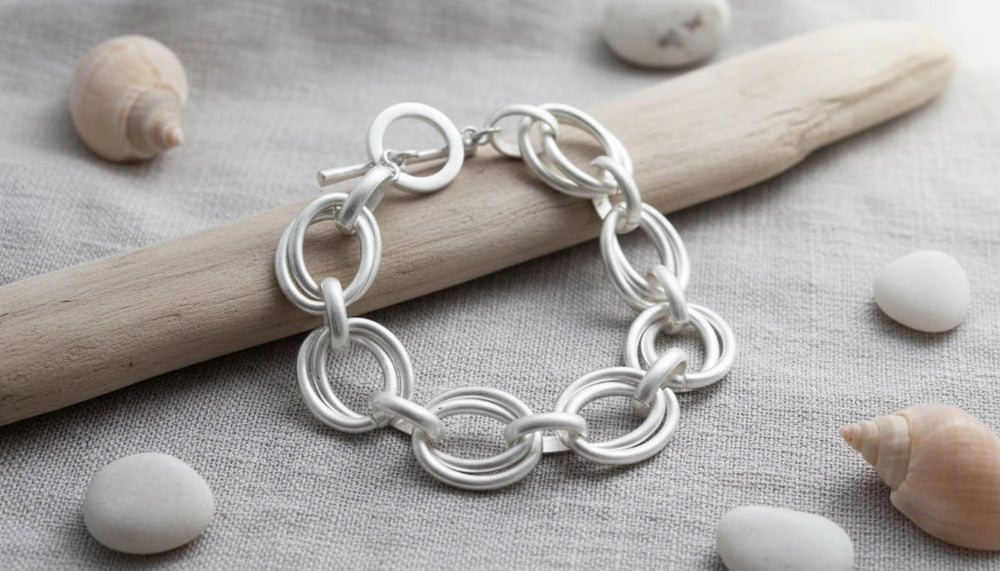 Silver Link Bracelet Featuring Interlocking Circles - Charming Charlie
