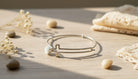 Gold Bangle with Cross Charm - Charming Charlie