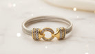 Two-Tone Cable Bracelet with Crystal-Studded Clasp - Charming Charlie