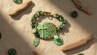 Green Cross Bracelet with Charms and Pearl Accents - Charming Charlie