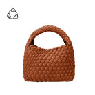 A smal saddle hand woven vegan leather top handle bag.