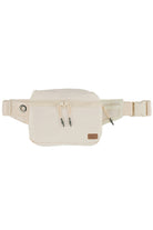Beige C.C Zipper Fanny Pack is a versatile and stylish accessory that provides hands-free convenience and organization. With a durable yet lightweight construction, this fanny pack is perfect for everyday use as well as travel and outdoor activities. Its convenient zipper design ensures secure storage of essentials, making it the perfect choice for those on the go.