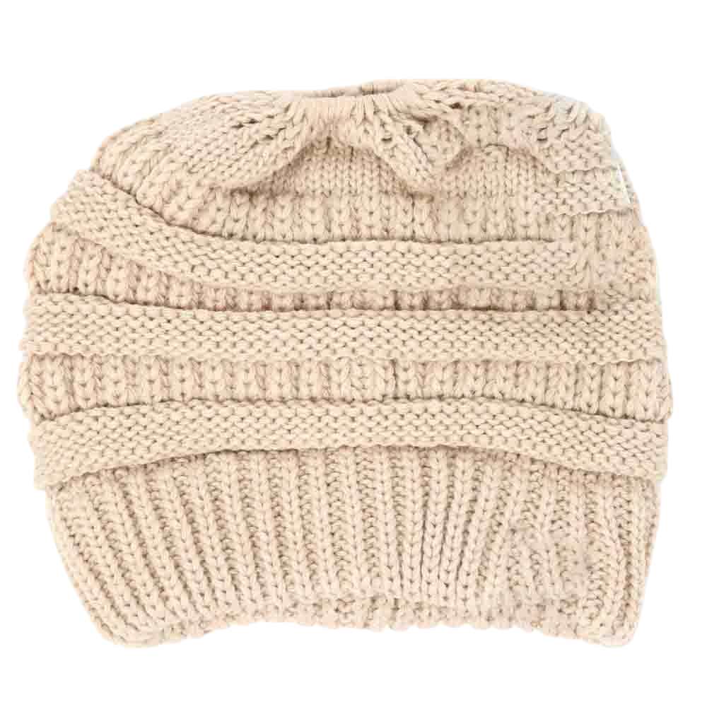 Beige Solid Classic CC Beanie Tail combines timeless style with functional warmth. Crafted from soft, durable fabric, this beanie offers reliable comfort during colder months. Its classic design ensures versatile wear, while the extended tail detail adds a unique twist, making it an excellent choice for stylishly protecting your head and ears from chill. Perfect for everyday use, it pairs seamlessly with various outfits to keep you cozy in expert fashion. 