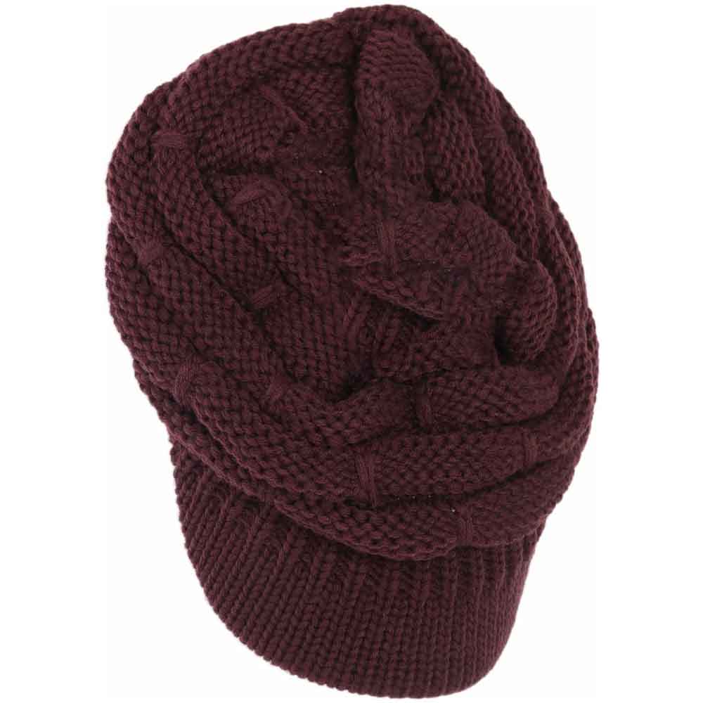Berry Ribbed Knit Hat with a Brim offers a sophisticated blend of texture and functionality. Crafted with a detailed ribbed stitch, this hat ensures warmth and durability, while the integrated brim provides essential sun protection without compromising style. Designed for those seeking a refined accessory, it delivers comfort and versatility suitable for various outdoor conditions.