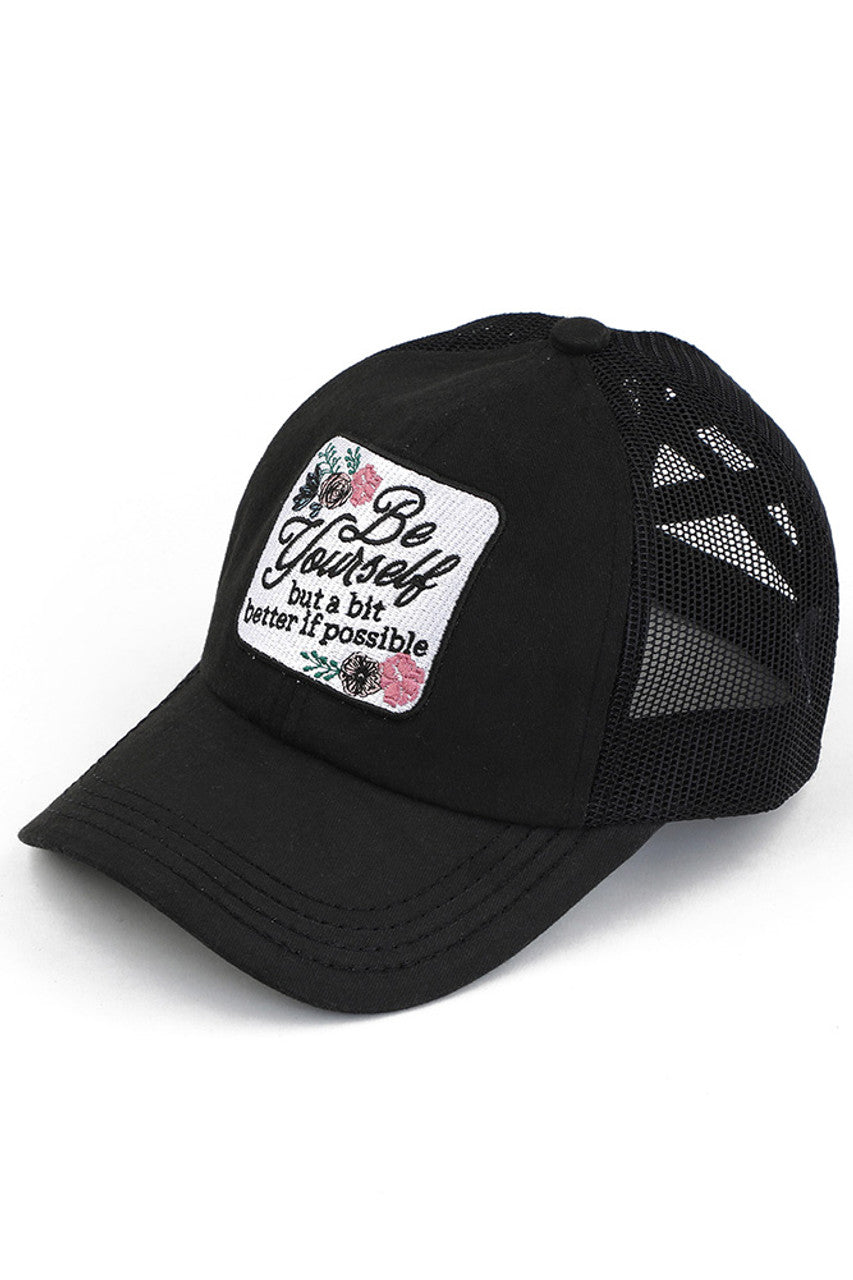 Black C.C BE YOURSELF PATCH CRISS CROSS PONY CAP is both stylish and practical. With a unique criss-cross design and a "Be Yourself" patch, this cap is perfect for any fashion-forward individual. The pony cap style also allows for comfortable and convenient wear. Express yourself with this versatile and trendy accessory.