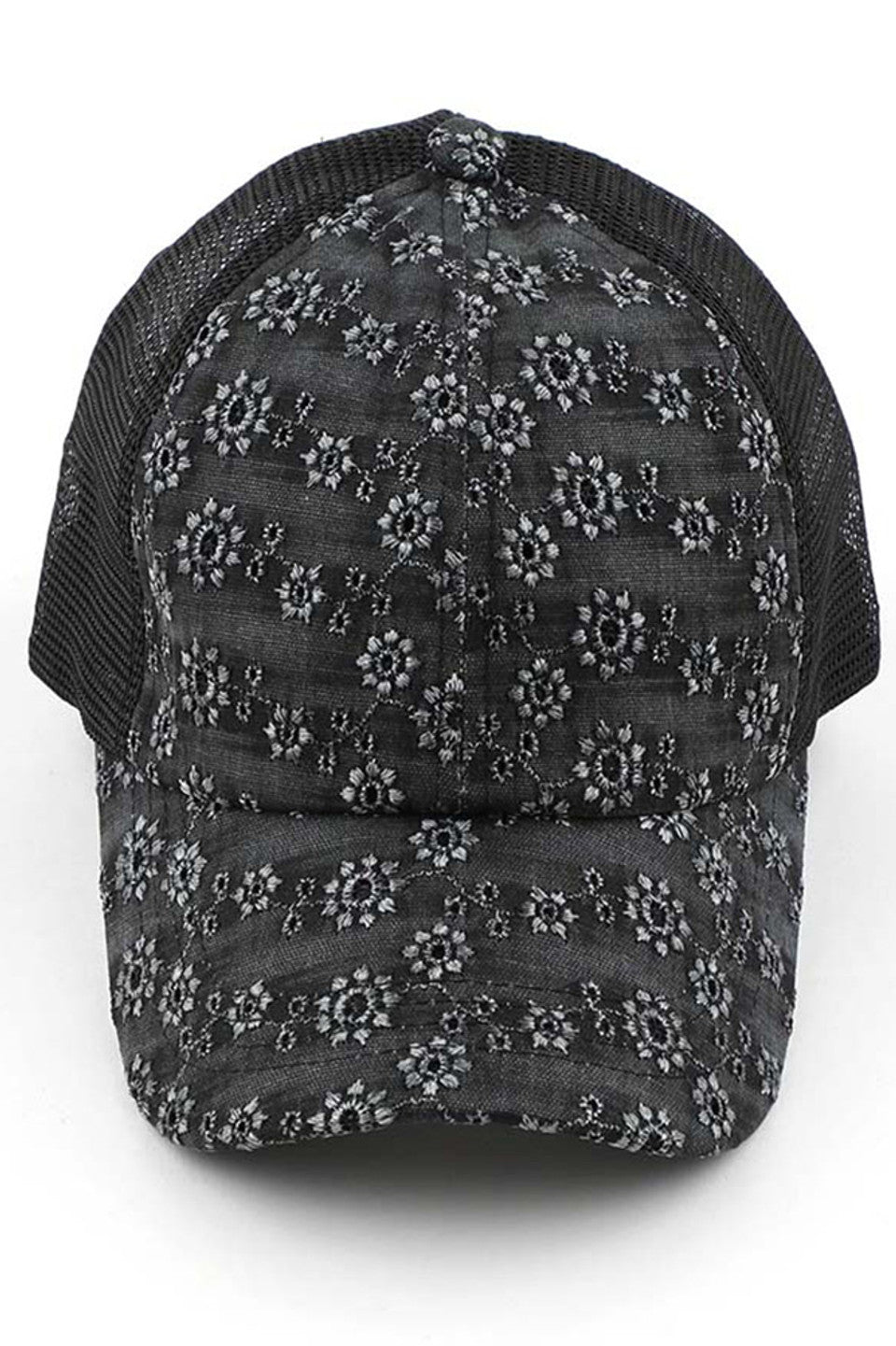 Black C.C FLOWER EMBROIDERY EYELET CRISS CROSS PONYCAP features delicate flower embroidery and eyelet detailing, with a criss cross design for a chic and stylish look. Made with quality materials, this cap offers both fashion and functionality. Perfect for any casual or outdoor activity, it will keep you cool and covered.
