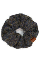 Black C.C. Multi Yarn Knit Solid Color Soft Scrunchies are the perfect addition to any hairstyle. Made with a blend of soft, durable yarn, they provide a comfortable and secure hold without pulling or damaging your hair. Available in a variety of solid colors, they are versatile and stylish.
