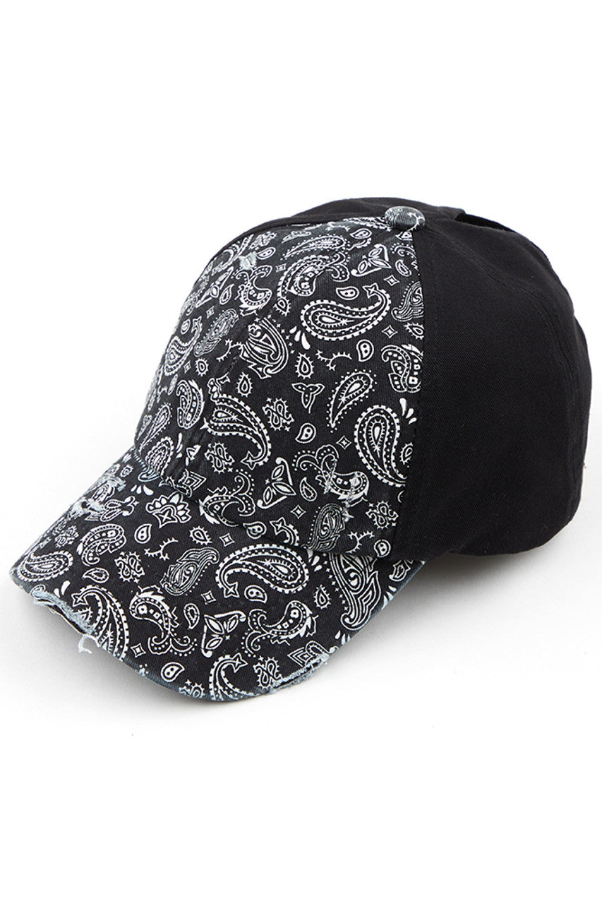 Black C.C Paisley Ponytail Baseball Cap is the perfect blend of style and functionality. Its unique design allows for a ponytail to be pulled through, keeping hair in place while also providing sun protection. Made with high-quality materials, this cap is a must-have for any fashion-forward and active individual.