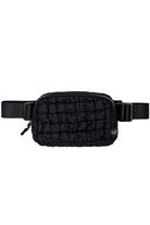 Black C.C Quilted Puffer Fanny Pack is a stylish and functional accessory for any on-the-go individual. Made with durable quilted material, this fanny pack provides convenient storage for your essentials while remaining comfortable to wear. Perfect for travelers, runners, and outdoor enthusiasts.