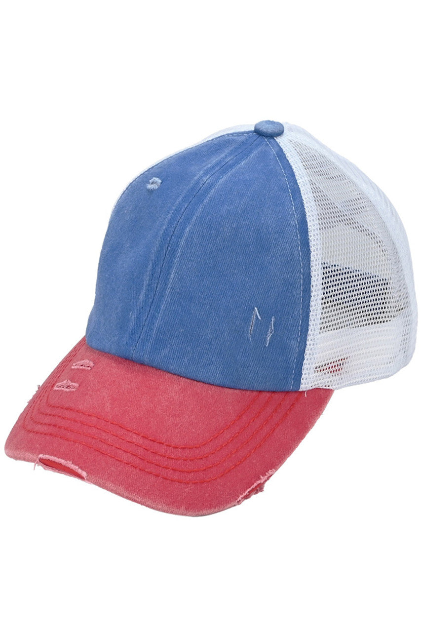 Blue C.C 3 Tone Crossed Mesh Back Trucker Pony Cap combines stylish design with functionality. Its mesh back allows for breathability, while the crossed design adds a unique touch. Perfect for those looking for a trendy yet practical cap option.