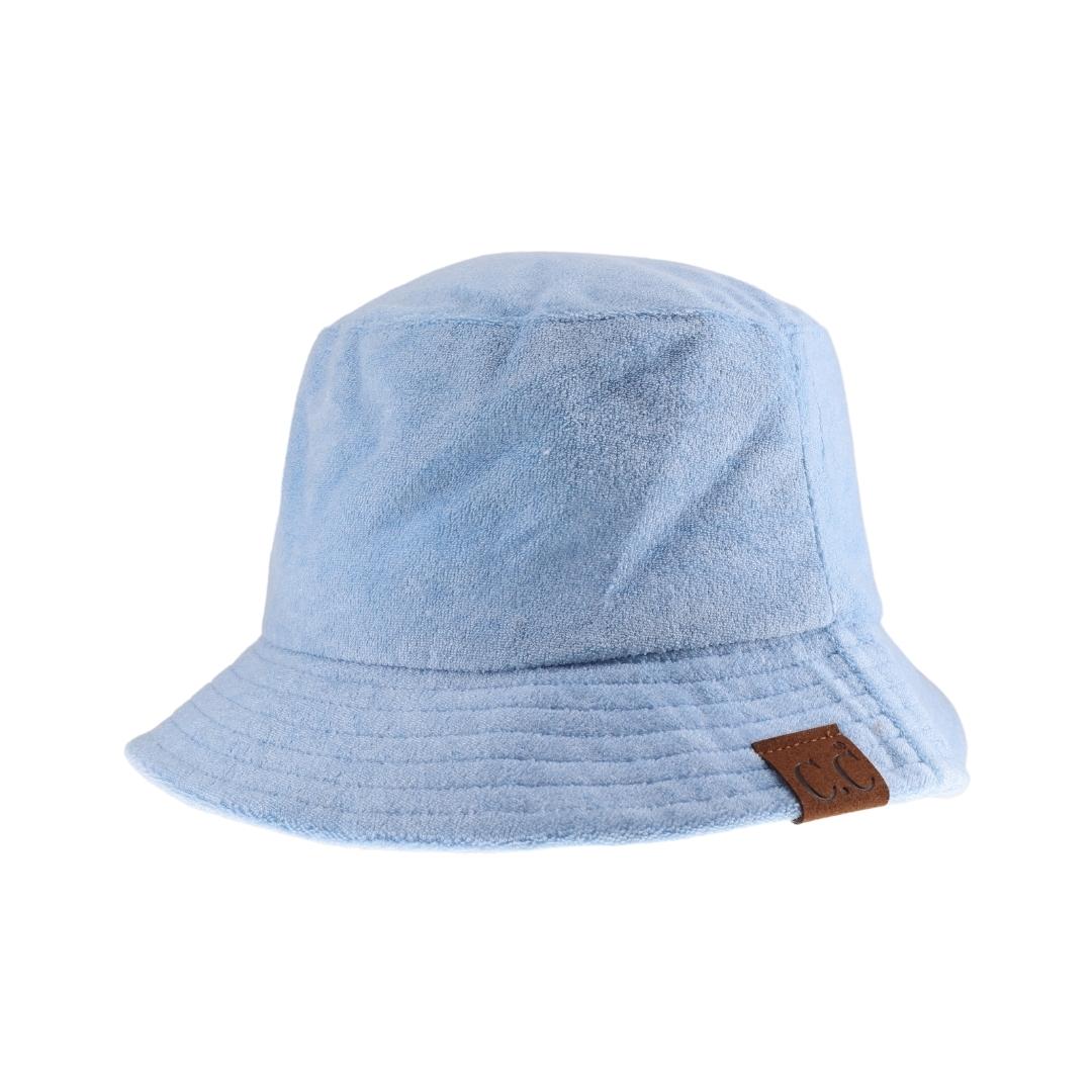 Blue Desart C.C. Terry Cloth Bucket Hat offers both style and functionality. It is made with high-quality terry cloth material, providing a comfortable and breathable fit. Perfect for sunny days, it also offers protection from harmful UV rays. Upgrade your summer wardrobe now.