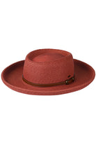 Brick C.C Vegan Leather Trim Boater Hat is a stylish accessory that will elevate any outfit. Made with vegan leather trim, this hat adds a touch of luxury while being cruelty-free. Its boater style not only looks fashionable but also provides excellent sun protection.