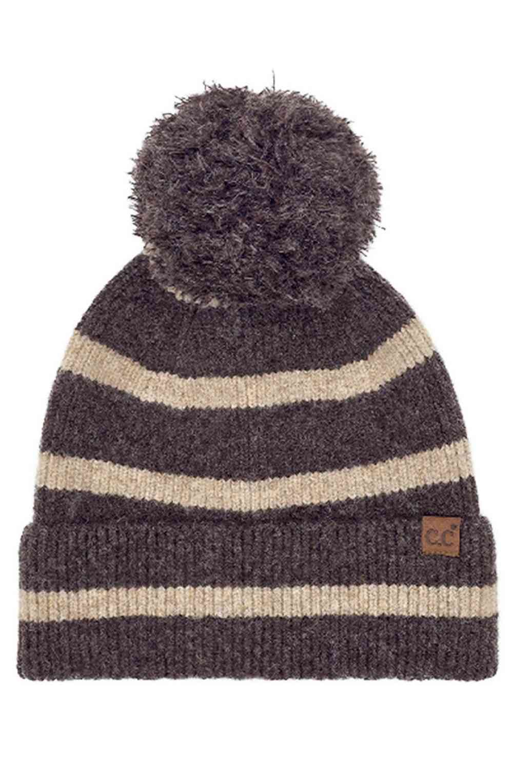 Brown Wrap yourself in cozy chic with the C.C Two Tone Stripe Yarn Pom Beanie. Its vibrant stripes and playful pom-pom effortlessly elevate any winter outfit. Crafted for both warmth and style, this beanie is the perfect accessory for your daily adventures or a thoughtful gift for a fashion-forward friend. Embrace the season in style – get yours today!