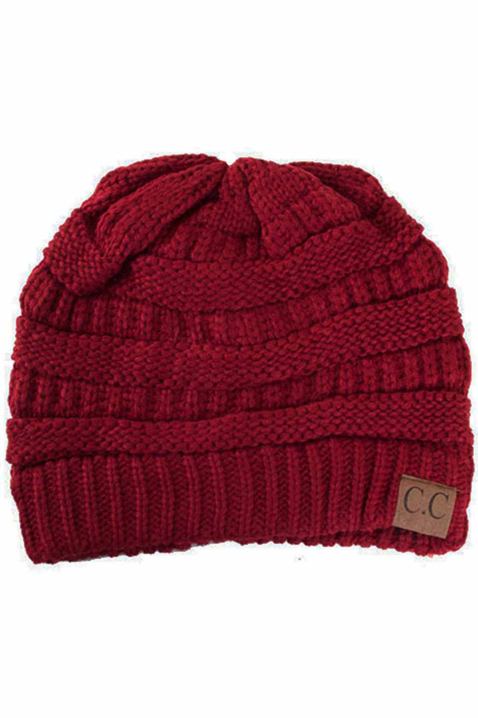 Burgundy  C.C Ribbed Knit Solid Color Beanie offers a timeless design with durable ribbed knitting, ensuring a snug and comfortable fit. Crafted for warmth and versatility, this beanie is perfect for everyday wear, providing reliable protection against cold weather while maintaining a sleek, minimalist style that complements any outfit. Its solid color adds understated appeal, making it an essential accessory for both casual and outdoor use. 