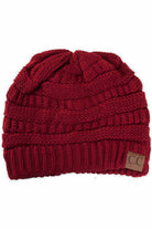 Burgundy  C.C Ribbed Knit Solid Color Beanie offers a timeless design with durable ribbed knitting, ensuring a snug and comfortable fit. Crafted for warmth and versatility, this beanie is perfect for everyday wear, providing reliable protection against cold weather while maintaining a sleek, minimalist style that complements any outfit. Its solid color adds understated appeal, making it an essential accessory for both casual and outdoor use. 