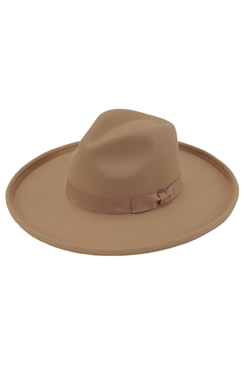 Camel C.C Rolled Edge Brim Vegan Felt Hat is a stylish and sustainable choice for any fashion-conscious individual. Made from high-quality vegan felt material, this hat features a rolled-edge brim design for a classic yet modern look. Perfect for any occasion, you can showcase your fashion sense while also supporting ethical and animal-friendly practices.
