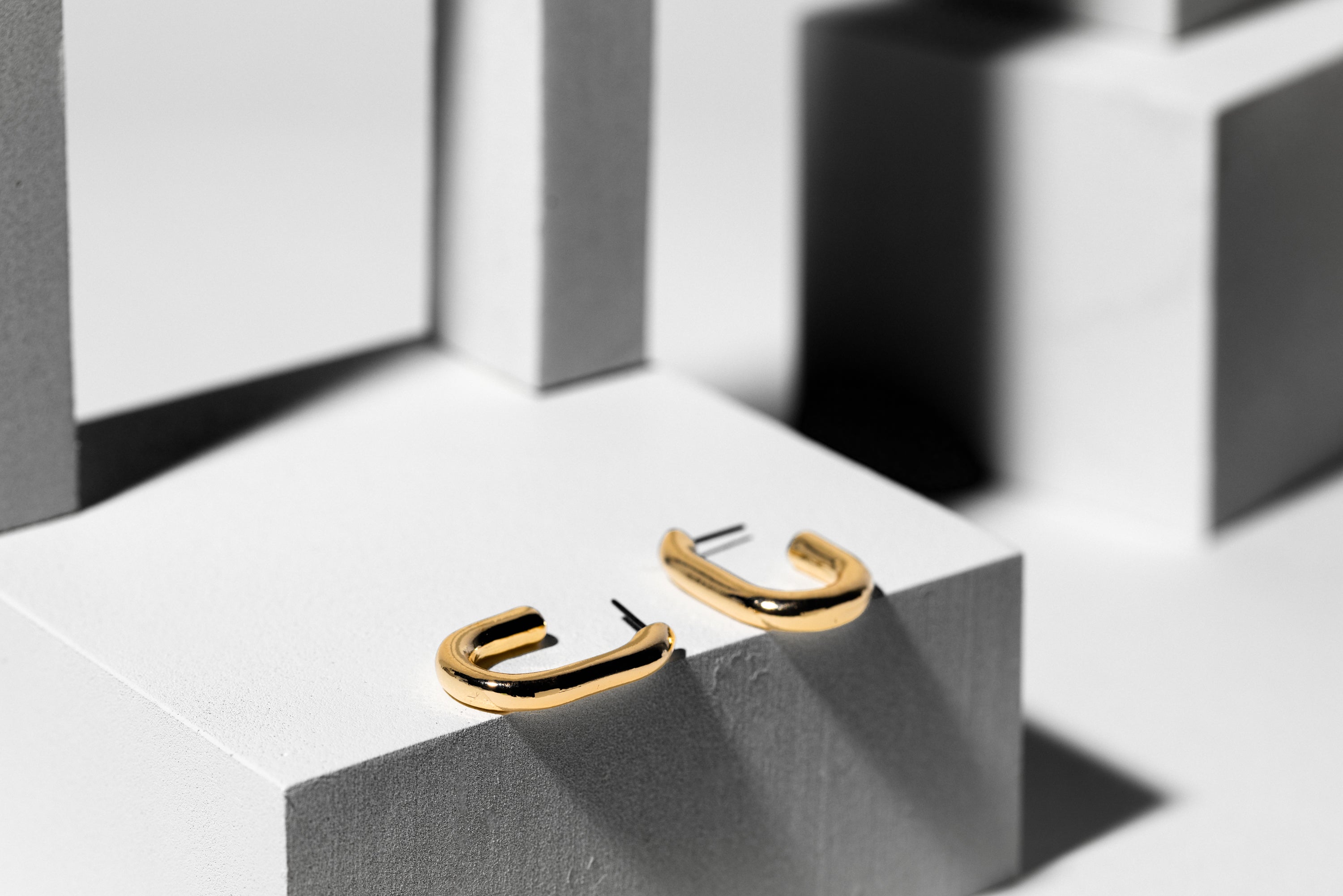 Smooth Gold Oval Earrings - Charming Charlie