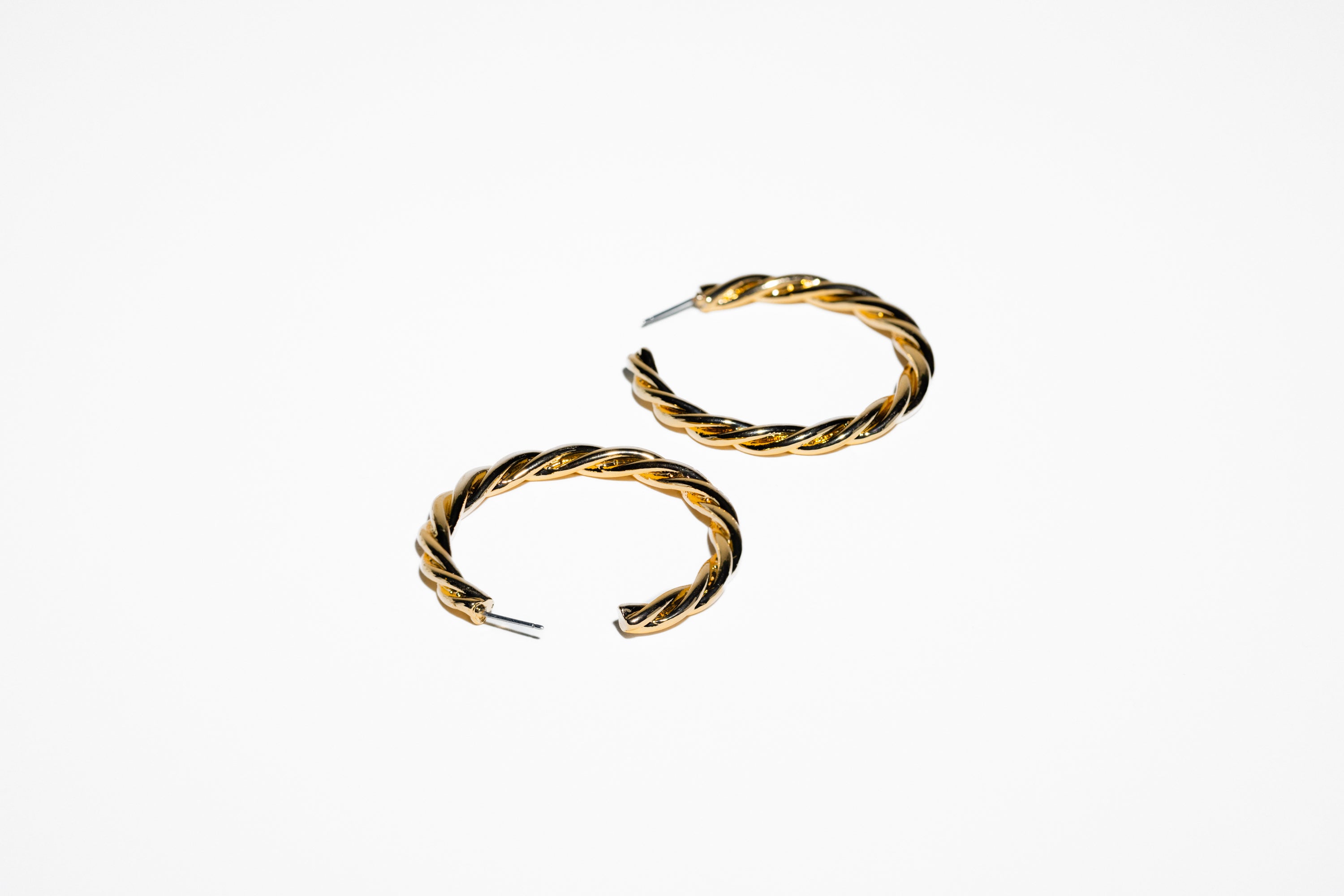 Twisted Gold Hoop Earring - Charming Charlie