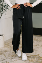 City Ease Wide Leg Bottoms in Black - Charming Charlie