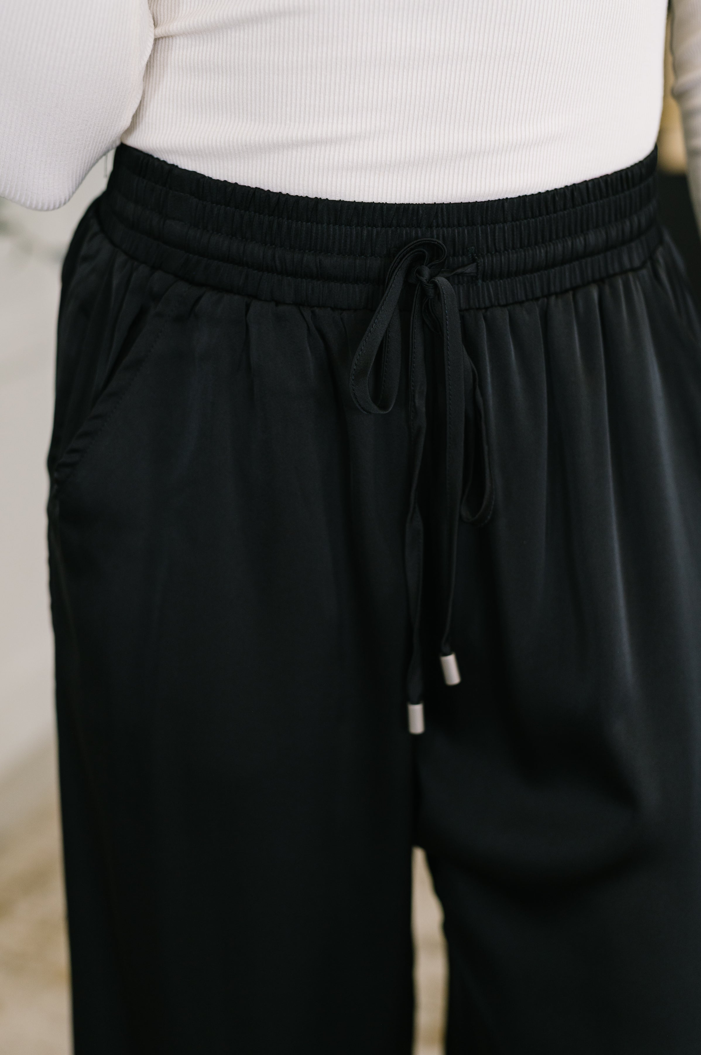 City Ease Wide Leg Bottoms in Black - Charming Charlie