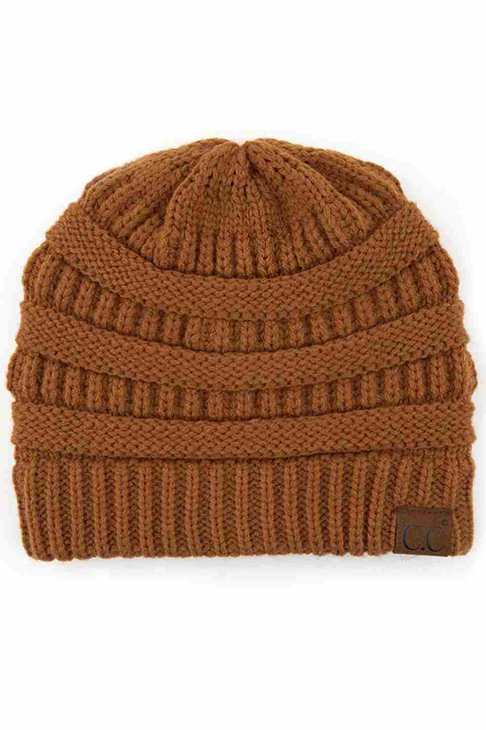 Clay C.C Ribbed Knit Solid Color Beanie offers a timeless design with durable ribbed knitting, ensuring a snug and comfortable fit. Crafted for warmth and versatility, this beanie is perfect for everyday wear, providing reliable protection against cold weather while maintaining a sleek, minimalist style that complements any outfit. Its solid color adds understated appeal, making it an essential accessory for both casual and outdoor use. 