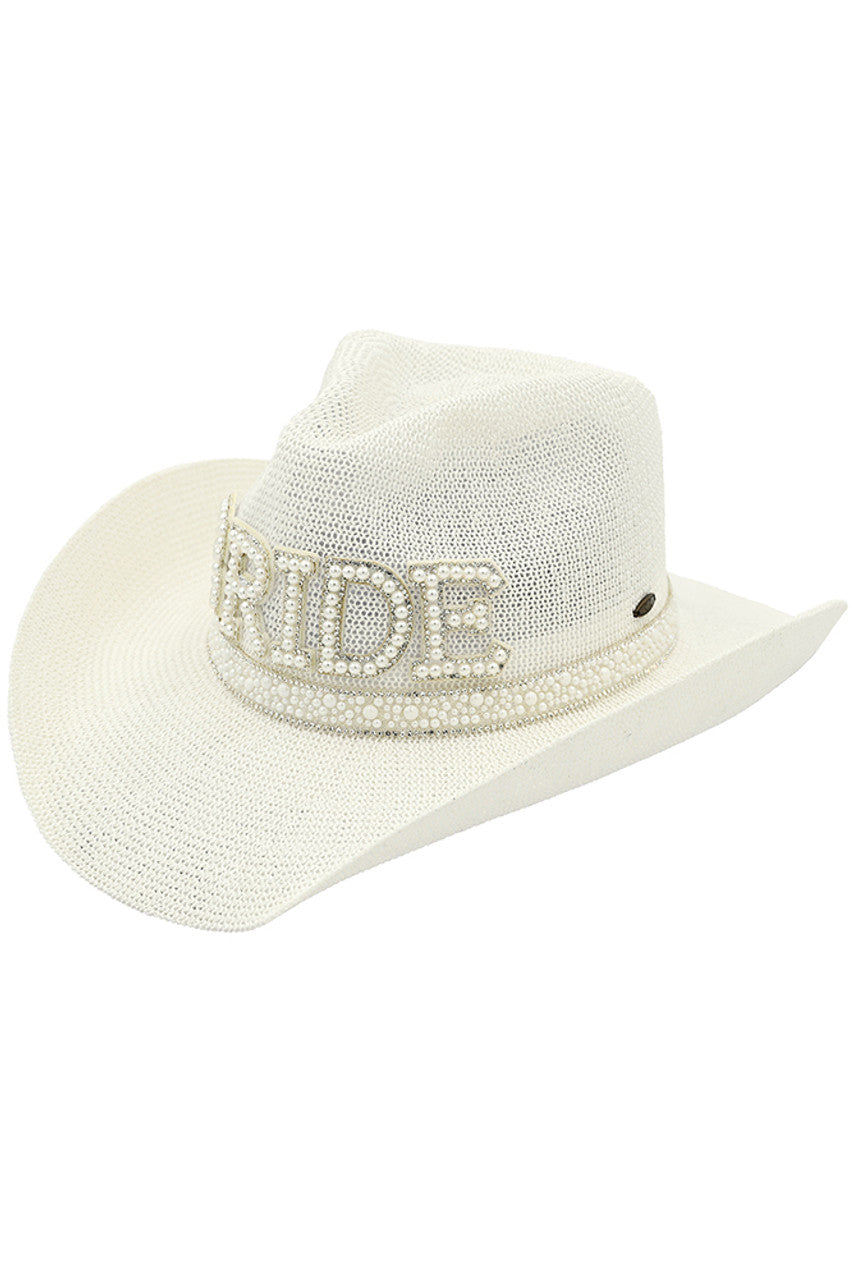 Clear White lC.C. Bride's cowboy hat features a beautiful pearl and rhinestone trim, adding a touch of elegance to a classic design. Perfect for weddings, festivals, and everyday wear, this hat will elevate any outfit and provide added sun protection. A must-have accessory for any fashion-forward cowgirl