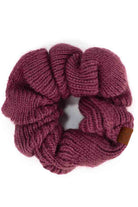 Coco Berry C.C. Soft Knit Scrunchies provide a stylish and comfortable way to keep your hair in place without causing damage. Made with soft knit material, they are gentle on your hair and perfect for everyday wear. Their scrunchy design also adds a trendy touch to your hairstyle