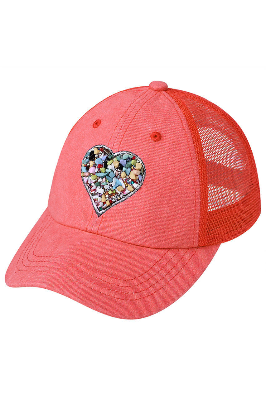 Coral C.C Heart Stone Embellishment Baseball Cap is perfect for adding a touch of sparkle to your outfit. With a heart-shaped stone embellishment, this cap adds a unique and stylish touch to any look. Stay on trend and protected from the sun with this must-have accessory.