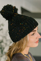 Cover Your Ears Pom Pom Beanie in Black - Charming Charlie
