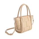 A nude woven wide strap vegan leather tote bag with double handle. 