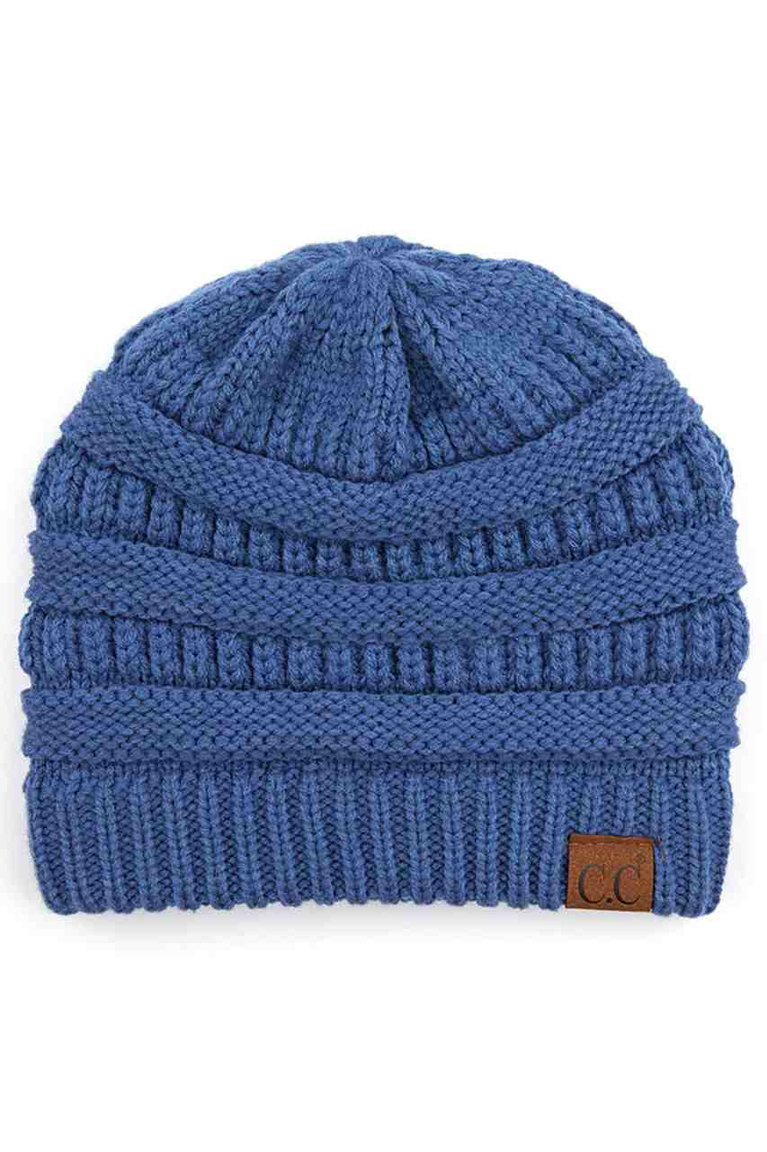 DarkDenim C.C Ribbed Knit Solid Color Beanie offers a timeless design with durable ribbed knitting, ensuring a snug and comfortable fit. Crafted for warmth and versatility, this beanie is perfect for everyday wear, providing reliable protection against cold weather while maintaining a sleek, minimalist style that complements any outfit. Its solid color adds understated appeal, making it an essential accessory for both casual and outdoor use. 