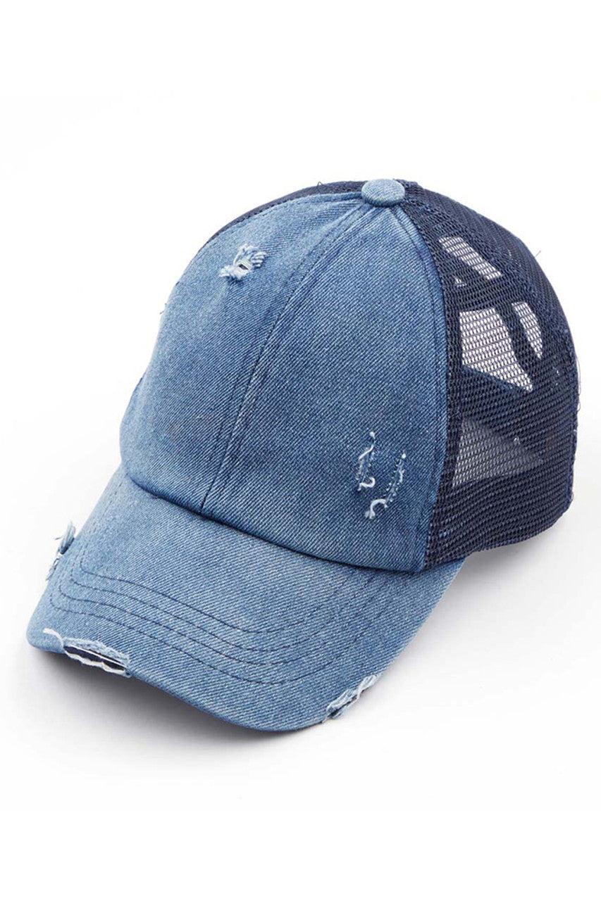 Denim-Navy- C.C BASEBALL PONYCAP is a stylish and functional cap that combines the classic look of a baseball cap with the convenience of a ponytail holder. Made with high-quality materials and a comfortable fit, this cap is perfect for any outdoor activity. Stay cool and protected with the C.C BASEBALL PONYCAP.