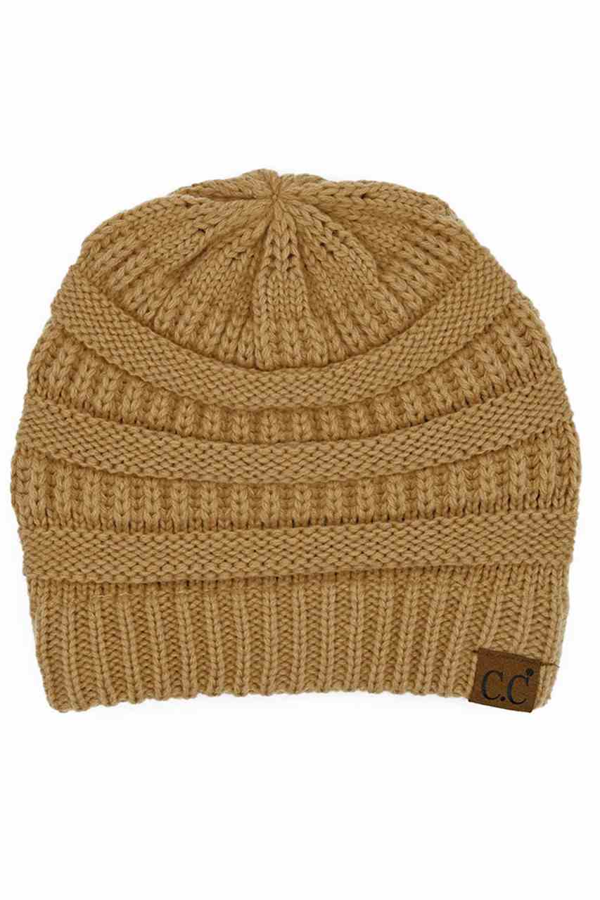 DesertCamel C.C Ribbed Knit Solid Color Beanie offers a timeless design with durable ribbed knitting, ensuring a snug and comfortable fit. Crafted for warmth and versatility, this beanie is perfect for everyday wear, providing reliable protection against cold weather while maintaining a sleek, minimalist style that complements any outfit. Its solid color adds understated appeal, making it an essential accessory for both casual and outdoor use. 