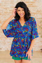 Dreamer Peplum Top in Royal and Red Abstract - Charming Charlie