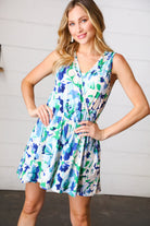 Lovely In Green & Blue Floral Sleeveless Surplice Romper - Charming Charlie