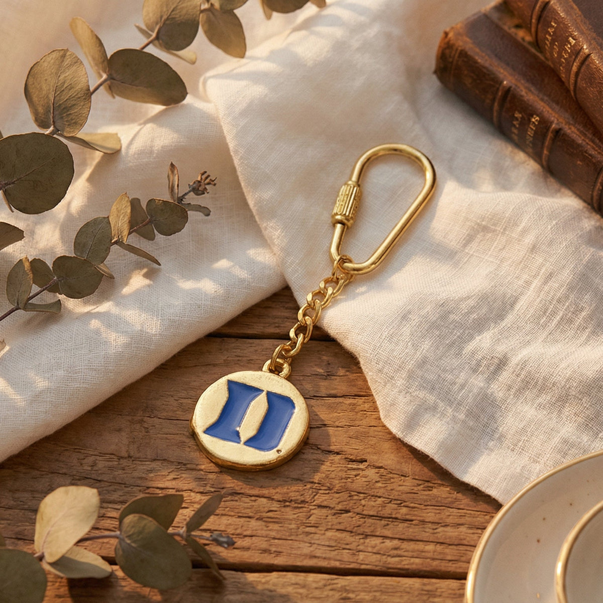 Small Gold Duke Blue Devils Logo Keychain – Charming Charlie