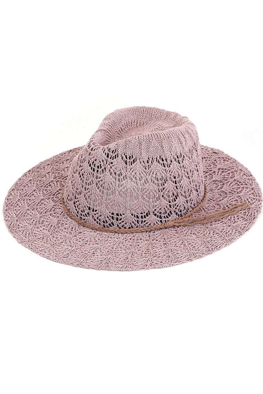 Dusty Rose  C.C. Horseshoe Lace Knitting Panama Hat is a must-have accessory for any fashion-forward individual. Its beautiful lace knit design adds a touch of elegance to any outfit, while the high-quality materials ensure durability and comfort. Stay stylish and protected from the sun with this iconic hat.