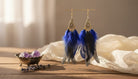 Royal Sapphire Feather Earrings - Charming Charlie