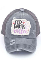 GRAY-C.C DISTRESSED TOP KNOTS AND COFFEE PATCH PONYCAP is an essential accessory for coffee lovers. Made with distressed fabric and a stylish top knot, it also features an embroidered coffee patch. Stay fashionable while showing off your love for coffee.