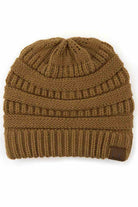 GoldenWalnut C.C Ribbed Knit Solid Color Beanie offers a timeless design with durable ribbed knitting, ensuring a snug and comfortable fit. Crafted for warmth and versatility, this beanie is perfect for everyday wear, providing reliable protection against cold weather while maintaining a sleek, minimalist style that complements any outfit. Its solid color adds understated appeal, making it an essential accessory for both casual and outdoor use. 