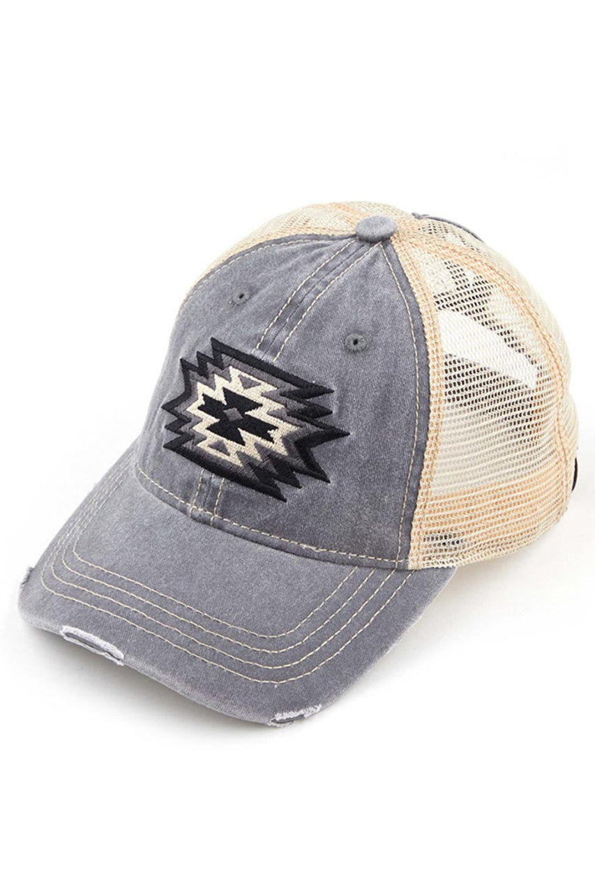 Grey C.C Aztec Patch Mesh Ponycap offers a stylish and breathable option for your outdoor activities. With its unique mesh design and eye-catching Aztec patch, this ponycap provides both fashion and functionality. Stay cool and trendy while protecting your head and face from the sun.