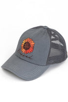 Gray  C.C DAISY PATCH BLESSED PONY CAP is the perfect accessory for any ponytail! With the bonus of a daisy patch, this cap not only keeps you in style but also adds a touch of femininity to your look. Keep your hair out of your face and elevate your outfit with this cap.