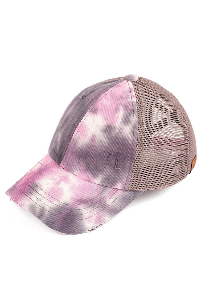 Gray C.C TIE DYE CRISS-CROSS MESH PONYCAP is a trendy and stylish addition to any outfit. With its unique tie-dye design and criss-cross mesh detailing, it's sure to turn heads. Made with high-quality materials, this ponytail cap provides both comfort and style. Perfect for any fashion-forward individual looking to make a statement.