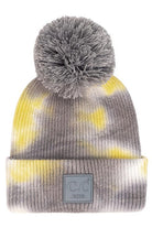 Gray Yellow C C Tie Dye Kids Beanie With C C Rubber Patch And Yarn Pom, beautiful tie dye design with yarn pom makes it unique and keeps you standing out with perfect beauty. Wear throughout the winter and cold days to ensure absolute comfortability. Coordinate with any outfit to match the best with perfect warmth and coziness. It Comes in one size winter cap with a pom that fits most head sizes. Enjoy the winter in comfort!