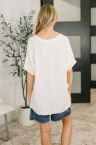 Growing Restless V-Neck Tee in White - Charming Charlie